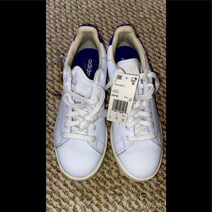 Blue Stan Smith adidas Sneaker shoes.